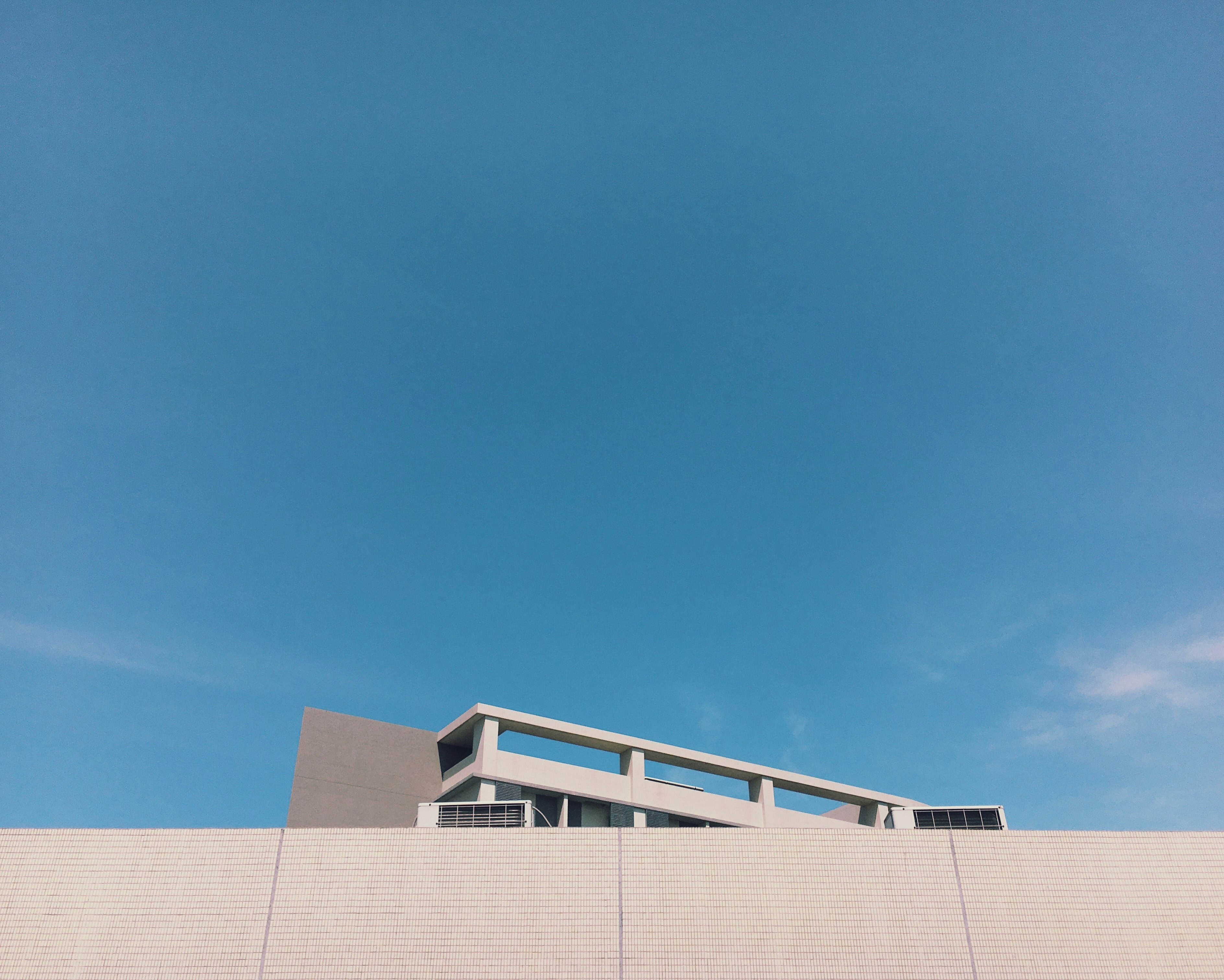 gray wall paint building during daytime